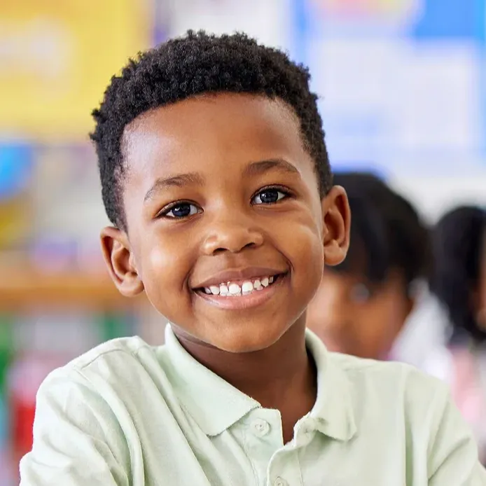 photo of child around a desk